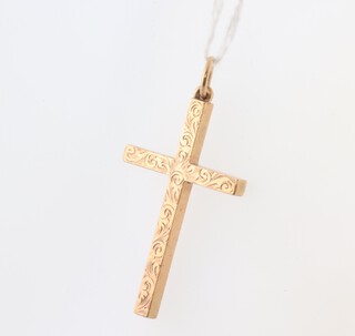 A 9ct yellow gold engraved cross pendant, 5.7 grams 