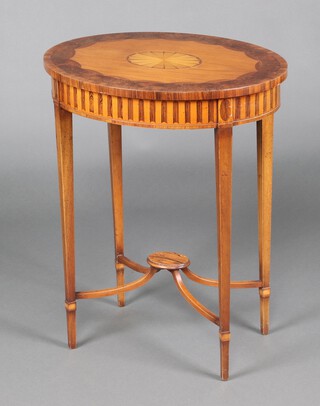 An Edwardian Sheraton style oval inlaid and crossbanded satinwood occasional table, the top decorated a fan with figured and rosewood crossbanding, raised on square tapered supports with X framed stretcher and spade feet  73cm h x 57cm w x 45cm d 
