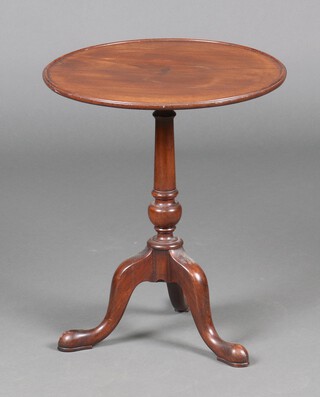 A Georgian style circular inlaid mahogany wine table, the top inlaid a star, raised on a pillar and tripod base 52cm x 43cm diam. 