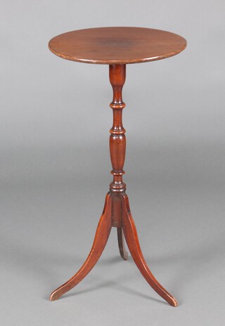 A 19th Century turned mahogany wine table, raised on a pillar and tripod base 76cm h x 40cm diam. 