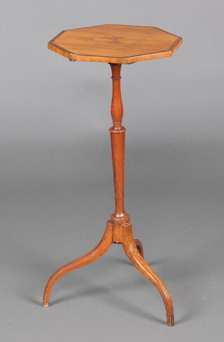 A 19th Century Sheraton style octagonal satinwood snap top wine table, raised on a pillar and tripod base 72 cm h x 32cm x 31cm 
