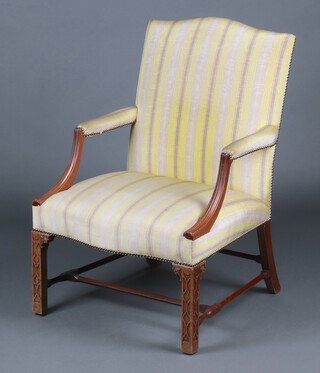 A Georgian style open arm library chair upholstered in white and yellow Regency striped material, raised on square supports 100cm h x 69cm w x 60cm d (seat 45cm x 43cm) 