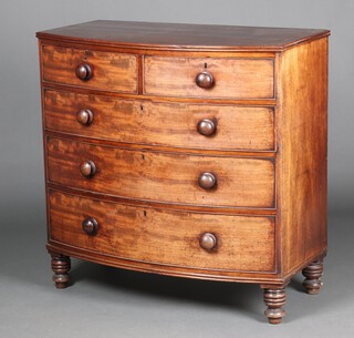 A 19th Century mahogany bow front chest of 2 short and 3 long drawers, raised on bun feet 104cm h x 105cm w x 54cm d  