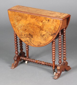 A Victorian oval inlaid figured walnut Sutherland table, raised on bobbin turned supports with ceramic casters 50cm h x 52cm x 12cm 