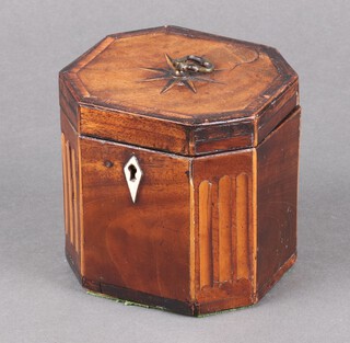 A Georgian inlaid mahogany tea caddy of octagonal fluted form, the lid inlaid a star with ivory escutcheon, 11cm x 11cm x 10cm Ivory Exemption Certificate 6RTJQ8U2