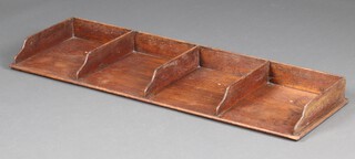 An Edwardian oak 4 division table top filing tray 10cm h x 125cm w x 40cm d