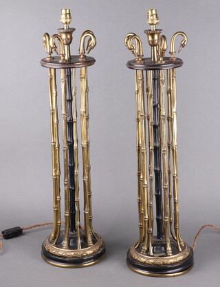 A pair of Regency style gilt bronze and black Japanned metal table lamps in the form of bamboo topped with swans heads 66cm h x 19cm 