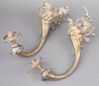 A pair of gilt metal wall light brackets in the form of elephants masks (previously gas lights) 15cm x 20cm x 32cm 