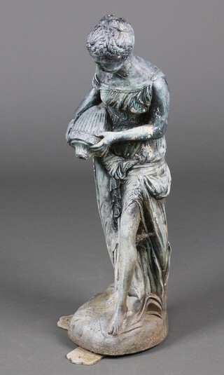 A verdigris painted concrete garden figure of a classical lady with an urn 83cm h 