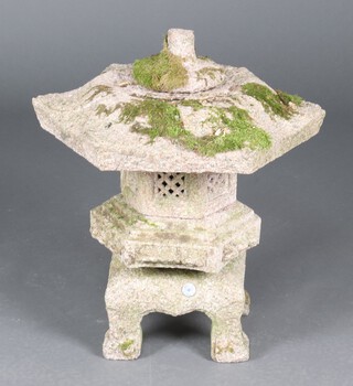 A Chinese carved granite model of a hexagonal pagoda, the base marked China Dream, in 5 sections, 69cm h x 50cm  diam. 