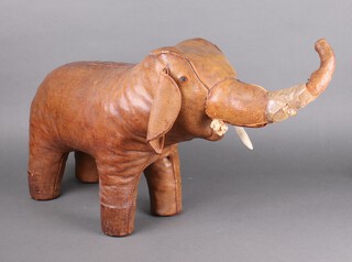 An Omersa style leather footstool in the form of a standing elephant 46cm h x 85cm w x 22cm d 