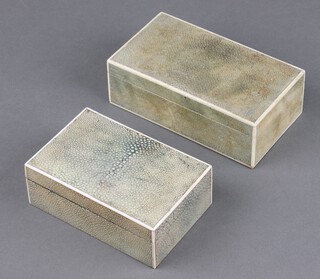 A 1930's Art Deco rectangular shagreen cigarette box with ivory edges and hinged lid 5cm x 18cm x 10cm based marked Brooks and Sons Edinburgh together with 1 other 5cm x 15cm x 10cm (lid is warped) Ivory Exemption Certificate M1BWRNVR