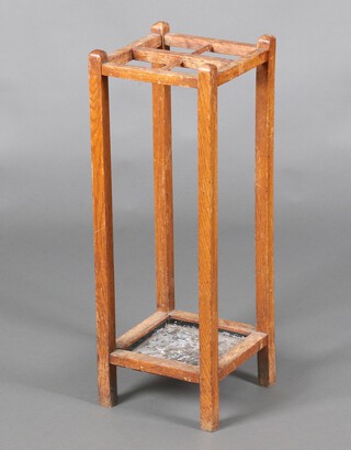 A bleached oak umbrella stand complete with drip tray 72cm h x 26cm 