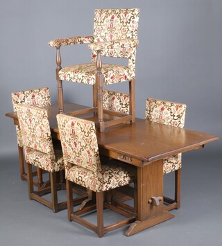An oak dining suite comprising a carved oak refectory style dining table 75cm h x 198cm l x 76cm w together with a set of 6 high back dining chairs upholstered in tapestry material - 1 carver, 5 standard 