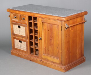 A hardwood free standing double sided kitchen island with granite top, fitted drawers, wine racks, cupboards and baskets, with towel rails to each end 86cm h x 131cm w x 60cm d 