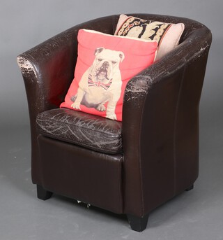 A black tub back armchair 80cm h x 72cm w x 61cm d (leather heavily worn) together with 2 cushions