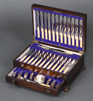 A canteen of silver plated Old English pattern flatware, contained in an oak box 