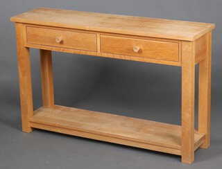 A hardwood side table fitted 2 frieze drawers with undertier, raised on square supports 76cm h x 122cm w x 32cm d  