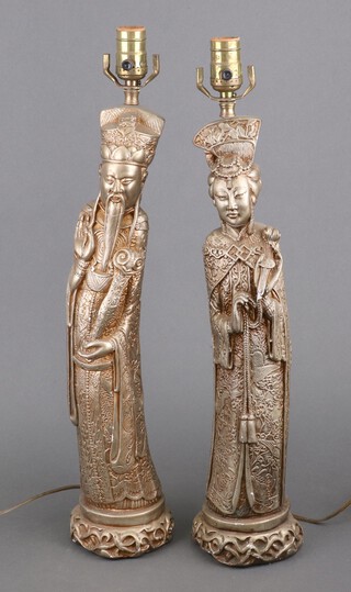A pair of gilt composition figures of a Chinese lady and gentleman, converted to electricity, 59cm