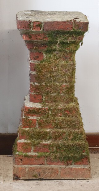 A well weathered brick built bird bath in the form of a square chimney pot 84cm h x 35cm 