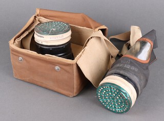 A World War II gas mask and case
