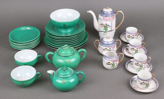 A Japanese 1930's part coffee set comprising coffee pot, sugar bowl and lid, milk jug, 4 saucers, 4 cups (3 items a/f), together with a Japanese green glazed gilt decorated part tea set comprising sugar bowl and cover, teapot and lid, sugar bowl, 2 cups, 6 saucers, 7 small plates, 2 medium plates (a/f)