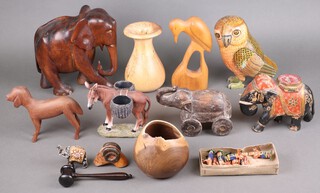 A child's hardwood elephant 24cm, 2 others and a quantity of carved wooden items 