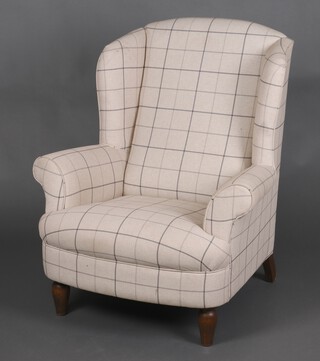A winged armchair upholstered brown and white checked material 100cm h x 75cm w x 61cm d (seat 36cm x 36cm)