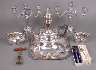 A silver plated 3 piece tea set, a cocktail shaker, a cork screw and other items of silver plate 