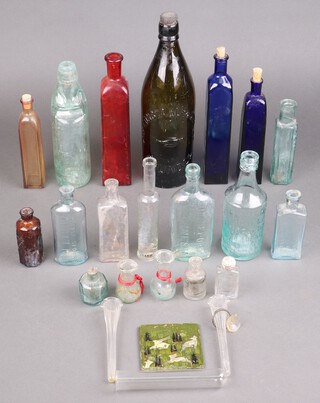 A glass bottle marked "G.S Constable & sons, Arundel" and a collection of Victorian and later glass bottles 