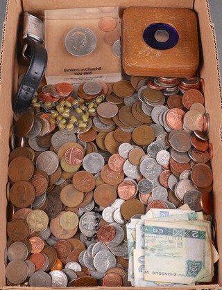 A collection of minor world coins, bank notes and an Armani wristwatch 