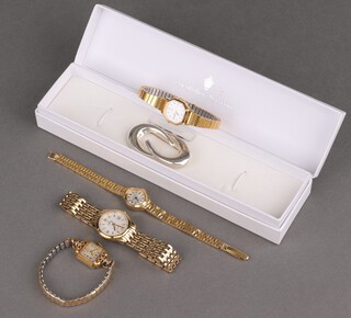 A 925 standard brooch and a collection of fashion wristwatches