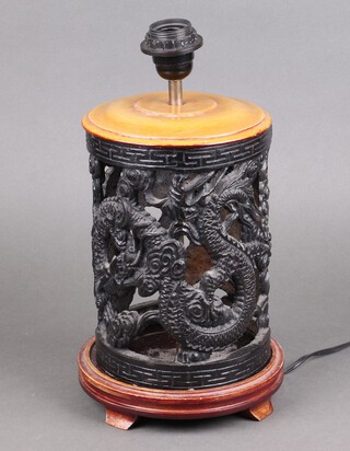 A Chinese pierced cast iron table lamp decorated dragons 29cm x 27cm 