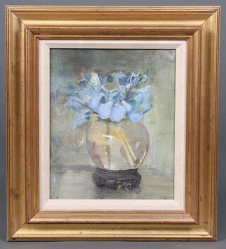 20th Century oil on board, still life study of a vase of irises, unsigned 28cm x 23cm 