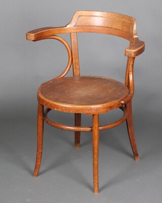 A Thonet style bentwood open arm chair, raised on circular supports 64cm h x 67cm w x 49cm d (split to back of seat) 