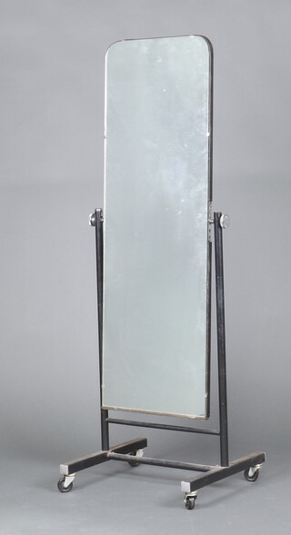A mid-century arched plate cheval mirror contained in a metal frame 148cm h x 50cm w  (chrome cap missing to right side) 
