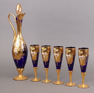 A Murano blue glass with gilt decoration ewer and stopper 39cm together with 5 flutes 