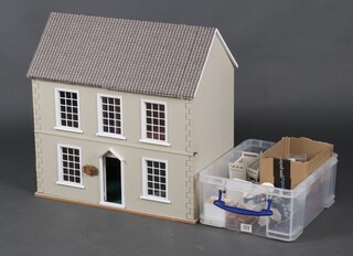 A grey painted wooden dolls house 62cm x 62cm x 36cm and contents of various furniture 