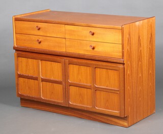 A mid-century Nathan style teak sideboard fitted 4 short drawers above cupboard enclosed by panelled doors 75cm h x 102cm w x 45cm d 