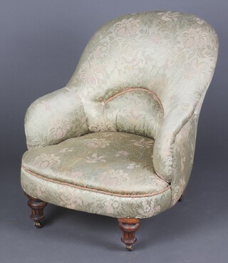 A Victorian metal framed tub back chair upholstered in gold material, on turned supports with brass casters 73cm h x 64cm w x 48cm (stain to seat, signs of old but treated worm to 1 leg)