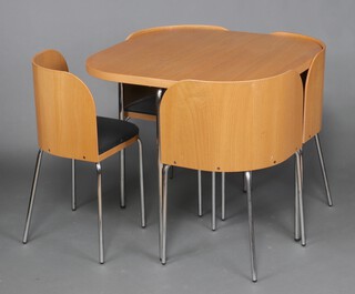 A mid-century wood grain effect laminate dining table together with a set of 4 tub back chairs on chrome supports 75cm h x 84cm w x 84cm d  