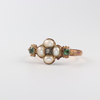 An 18ct yellow gold seed pearl, peridot and diamond ring, the diamond 0.10ct, size J, 1.7 grams