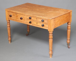 A Victorian rectangular pine writing table fitted 1 long and 2 short drawers, raised on turned supports 78cm h x 119cm w x 70cm d  