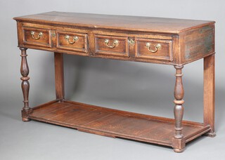 An 18th Century oak dresser base with geometric mouldings, fitted 4 short drawers with replacement handles, raised on bulbous turned supports with undertier 89cm h x 161cm w x 50cm d 