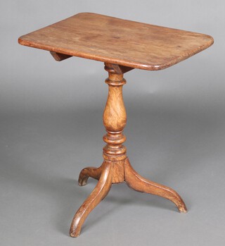 A 19th Century rectangular bleached mahogany snap top wine table, raised on a bulbous turned column and tripod base 71cm h x 60cm w x 48cm d 