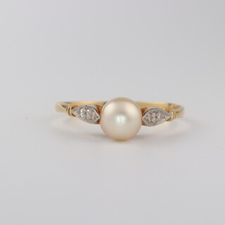A 9ct yellow gold, pearl and diamond ring, the pearl 7mm, the diamonds 0.02ct, size O 1/2, 1.9 grams 