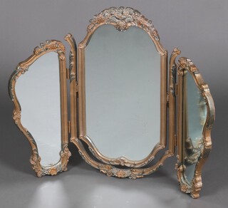 Atsonea, a 1960's Rococo style arched shape triple plate dressing table mirror contained in a gilt plaster frame 62cm x 57cm 