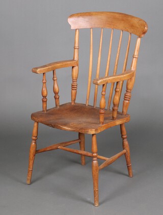 A Victorian beech and elm stick and bar back Windsor Kitchen carver chair with solid seat, raised on turned supports with H framed stretcher 105cm h x 50cm w x 44cm d (seat 29cm x 42cm) 