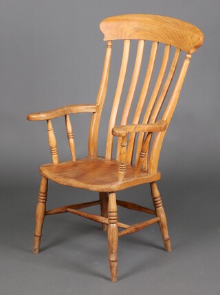 A 19th Century bleached elm and beech stick and bar back carver chair, raised on turned supports with box framed stretcher 112cm h x 47cm w x 46cm d (seat 31cm x 36cm)