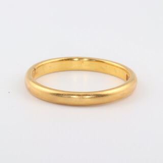 A 22ct yellow gold wedding band, size N, 3.4 grams 
